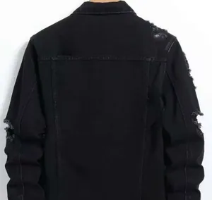 Close-up back view of black distressed denim jacket for men featuring ripped sleeve details