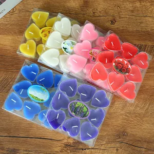 Set bunter herzförmiger Teelichter in durchsichtigen 9er-PVC-Verpackungsboxen für Feiern