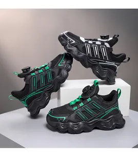 Detail view of children's mesh running shoes with rotating button closure system