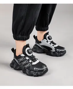 Close-up of children's breathable running shoes with rotary dial button system
