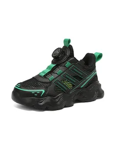 Detailed view of children's sports shoe with green accents and rotary buckle system