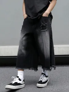 Pantaloni culotte in denim lavato vintage da uomo con sfumatura e orli sfrangiati