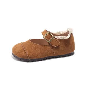 Girls' brown suede Mary Jane shoes with elegant lace trim and adjustable buckle.