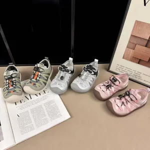 Breathable mesh children's sneakers in multiple colors displayed on lifestyle props