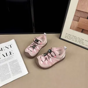 Breathable pink mesh sneakers for children with convenient adjustable lace toggles