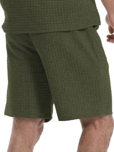 Detailed view of olive green waffle knit texture on men's summer casual shorts set