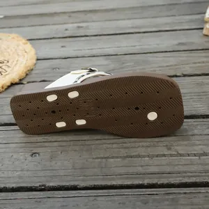Close-up detail of the non-slip platform sole on casual women's summer flip-flops