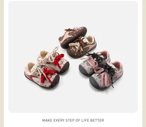 Close-up view of various color baby walking shoes with breathable mesh and non-slip soles