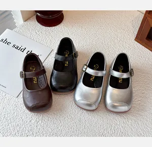 Group of girls' Mary Jane princess shoes in black, brown, and silver colors.