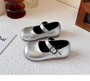 Classic silver Mary Jane shoes for girls featuring a metallic finish and buckle straps