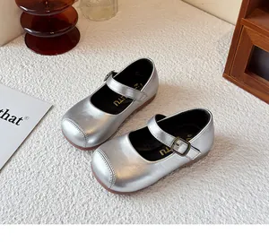 Classic silver metallic Mary Jane shoes for girls featuring a vintage buckle strap design