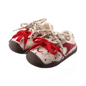 Breathable baby walking shoes with decorative red bow and protective anti-slip toe caps