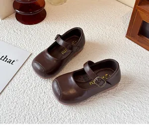 High-quality detail view of brown British style Mary Jane leather shoes for little girls