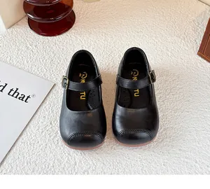Classic black leather Mary Jane shoes for girls with a vintage bronze buckle detail