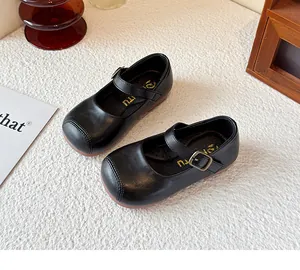 Top view of classic black British style Mary Jane shoes for girls featuring a metal buckle