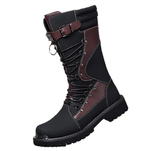 Vintage men's high-top motorcycle boots with rugged metal accents and laces on white background