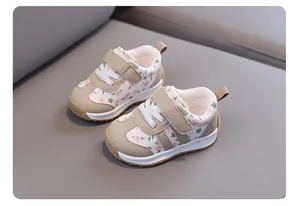 Detailed close-up of floral print baby walking shoes with soft non-slip soles