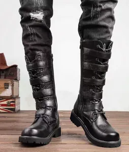 Close-up detail of men's high-top black leather knight boots featuring multiple strap buckles