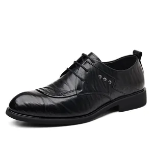 Men's black formal leather shoes with unique hand-grabbed texture and lace-up closure