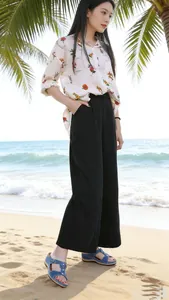 Full-body model view showing casual platform sandals with metal buckle on beach