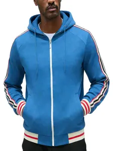 Detailed view of a blue men's zip hoodie with striped side tape and ribbed cuffs
