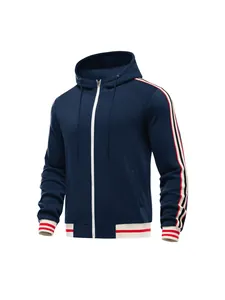 Close-up detail of navy blue hooded zip-up sweatshirt with red and white stripes
