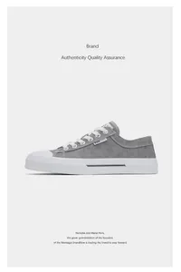 Retro grey low-top canvas sneaker with white lace-up and durable white rubber sole