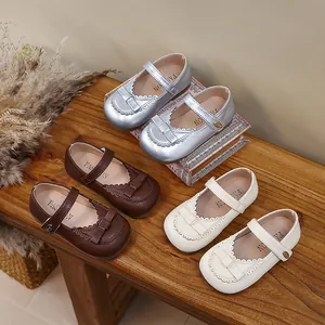 Elegant girl's Mary Jane princess shoes in silver, brown, and white colors