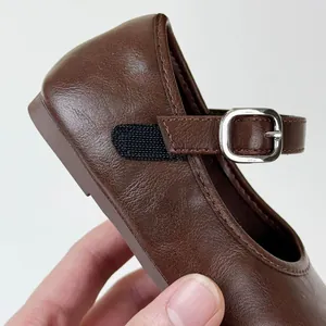 Brown faux leather Mary Jane shoes for girls with silver buckle and soft sole