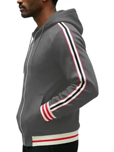 Detail view of a men's grey zip-up hooded sweatshirt featuring multi-color striped sleeves