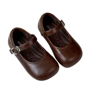 Classic brown Mary Jane shoes for girls with adjustable buckle and soft sole