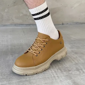Retro tan chunky platform derby shoes with 7cm height increase and round toe design
