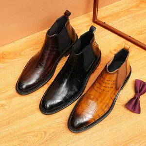 Retro leather Chelsea boots for men with unique engraved script pattern in three colors
