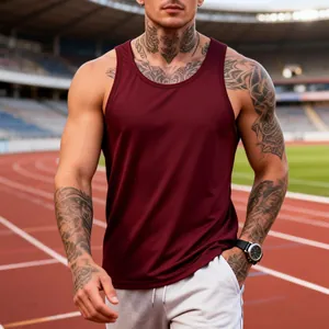 Detail view of a burgundy men's quick-dry sports tank top on a model at a stadium