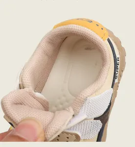 Close-up of breathable mesh interior and cushioned insole of toddler sneakers
