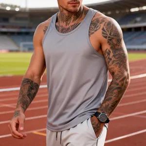 Close-up of grey men's quick-dry athletic tank top on a fitness model at a stadium