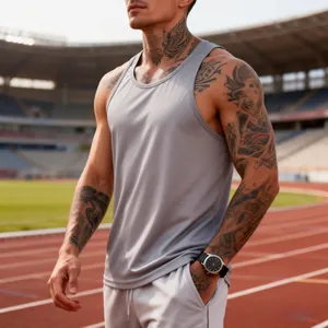 Detailed shot of a men's quick-dry gray sports tank top worn on an athletic track