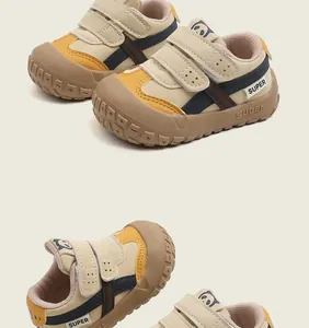 Detail view of toddler walking sneakers with soft rubber soles and velcro straps
