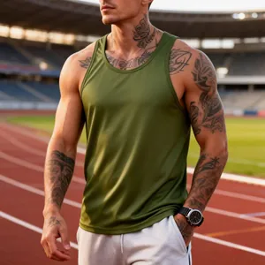 Athletic men's olive green quick-dry tank top detail shown at an outdoor stadium