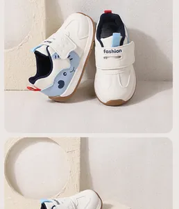 Comfortable baby walking shoes with cute cartoon whale design and soft non-slip sole.