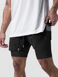 Vista de bolsillo para móvil en el forro de los pantalones cortos 2 en 1 para hombre