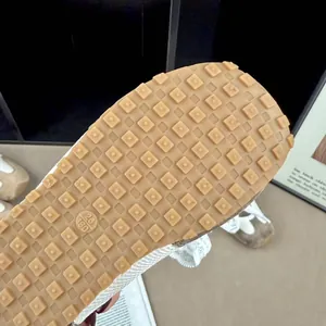Close-up of durable rubber outsole with waffle traction pattern on kids sneakers.