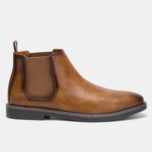 Vue latérale de bottines Chelsea vintage marron pour hommes avec panneaux élastiques.