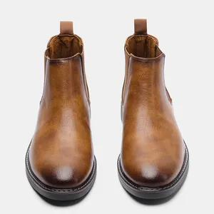 Men's classic brown leather Chelsea boots with retro rubbed finish and round toe