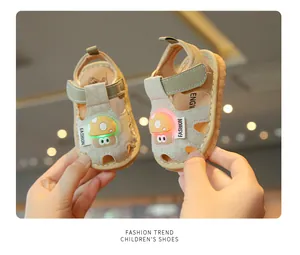Close-up of baby light-up sandals with a cute glowing mushroom design and soft soles