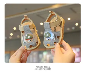 Detailed close-up of LED light-up baby walking sandals with cute mushroom design