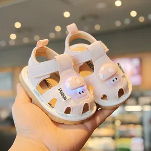 Adorable pink cartoon mushroom light-up baby sandals with soft soles for toddler walking