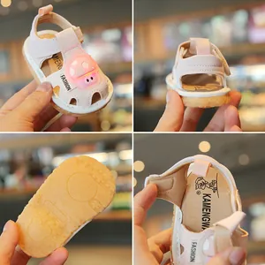 Cute pink toddler walking sandals with light-up mushroom motif and soft anti-slip sole