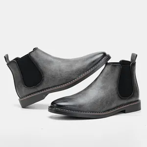 Stylish vintage distressed gray men's Chelsea boots with black elastic side panels