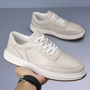 Men's beige genuine leather sneakers with top layer cowhide and breathable white sole.